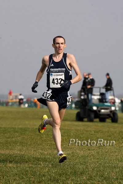 David McNeill almost broke Galen Rupp's course record (28:03) in finishing a distant but respectable second: Photo courtesy of PhotoRun.net