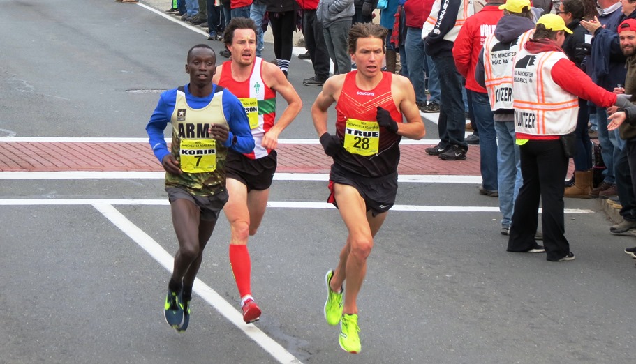PHOTO: Leonard Korir, Chris Thompson and Ben True setting up for the final sprint of the 2016 Manchester Road Race (photo by David Monti for Race Results Weekly)