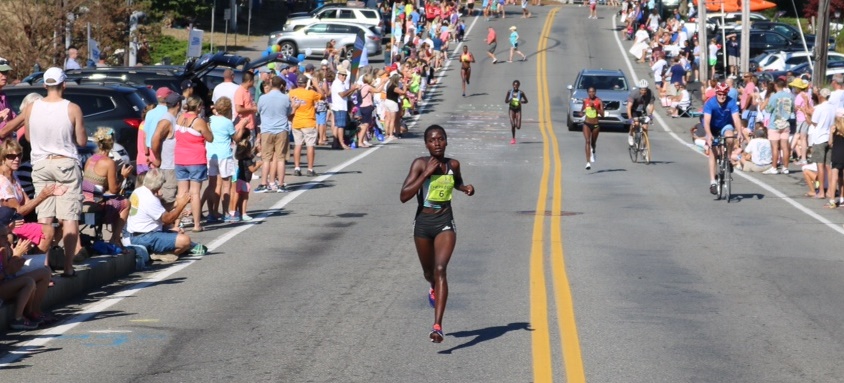 Caroline Chepkoech on her way to winning the 2016 New Balance Falmouth Road Race (photo by Chris Lotsbom for Race Results Weekly)