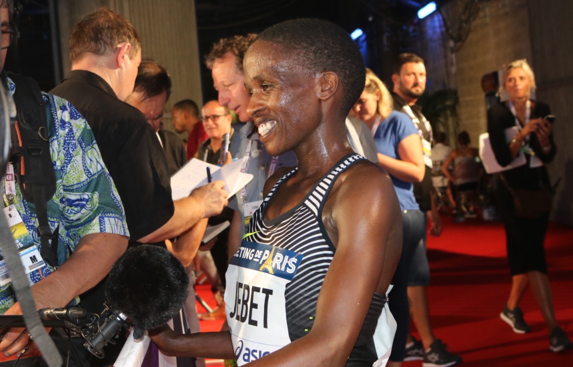 PHOTO: Ruth Jebet of Bahrain after breaking the world record in the women's steeplechase at the 2016 Meeting de Paris (photo by Chris Lotsbom for Race Results Weekly)