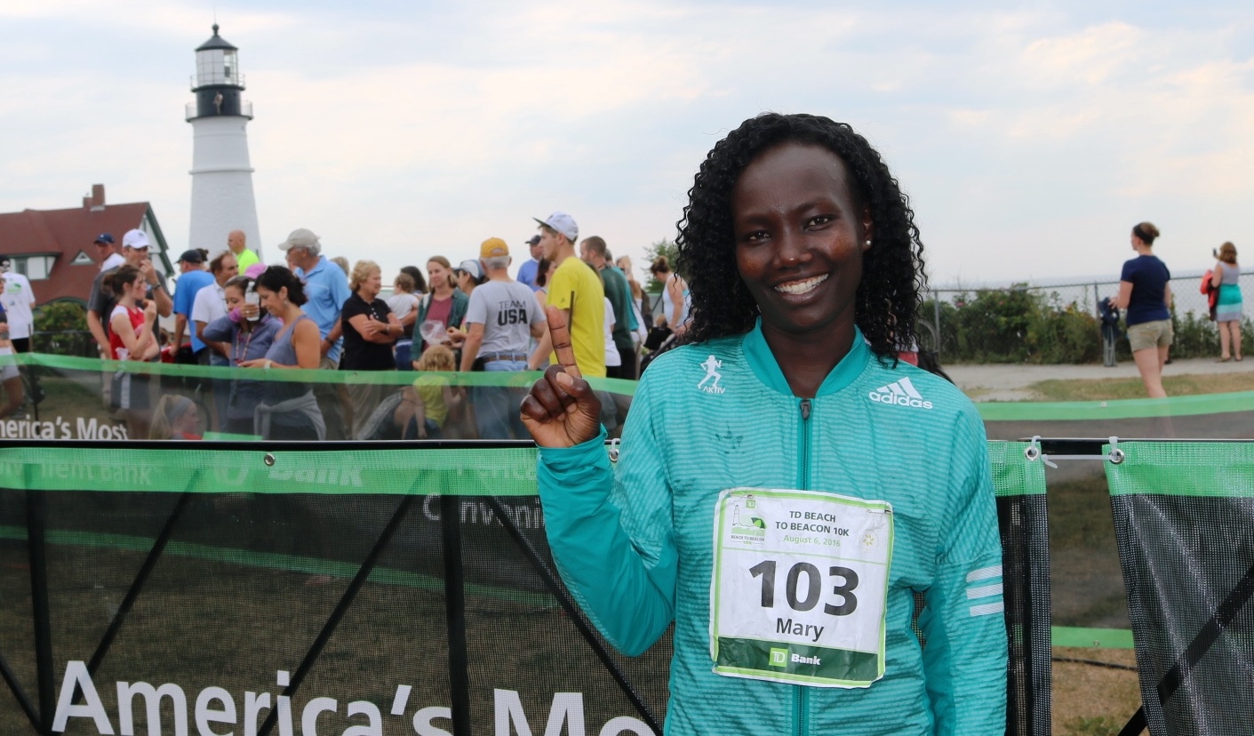 PHOTO: Mary Keitany after shattering the course record at the TD Beach to Beacon 10-K in Cape Elizabeth, Me. (photo by Chris Lotsbom for Race Results Weekly) 