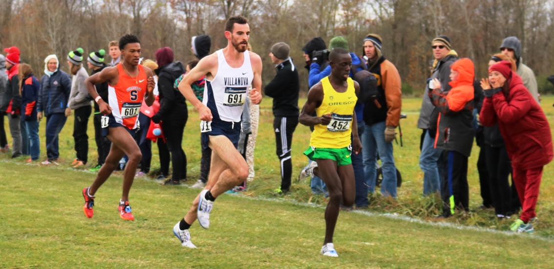 PHOTO: Patrick Tiernan of Villanova (center) runs with Justyn Knight (left) of Syracuse and Edward Cheserek of Oregon on the final lap of the 2016 NCAA Division I Cross Country Championships (photo by Chris Lotsbom for Race Results Weekly)
