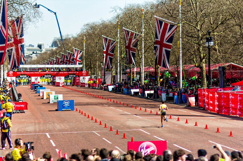 SOS athlete Patrick Rizzo finishing the London Marathon in 12th place. April, 2013. Rizzo has found that without effective fuelling he is unable to get the most out of his fitness and regularly practices taking on fluids in training.
