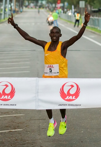 Honolulu Marathon's Men's first place finisher Sunday, Dec. 11, 2016, Estimated 25,000 runners from all over the world participated in the annual race in Honolulu. Photo By Eugene Tanner/Honolulu Marathon